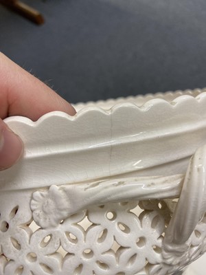 Lot 346 - Leeds Pottery. A large Leeds creamware chestnut basket with cover and stand