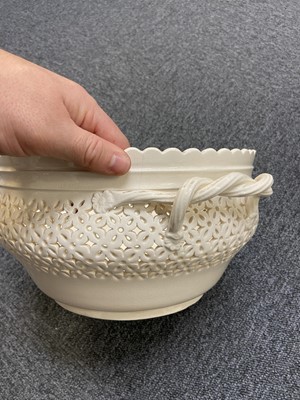 Lot 346 - Leeds Pottery. A large Leeds creamware chestnut basket with cover and stand