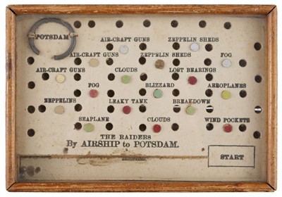 Lot 104 - Airship Game. The Raiders by Airships to Potsdam glass top puzzle game, circa 1918