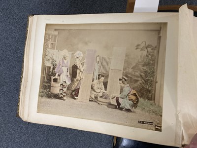 Lot 48 - Japan. An album containing 49 photographs by Kusakabe Kimbei, Raimond von Stillfried