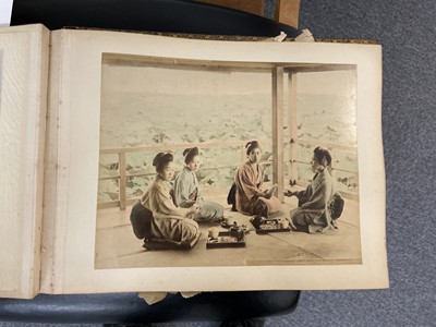 Lot 48 - Japan. An album containing 49 photographs by Kusakabe Kimbei, Raimond von Stillfried