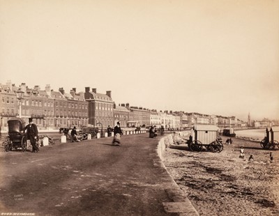 Lot 28 - Great Britain & Ireland. An album containing approximately 70 mostly corner-mounted photographs