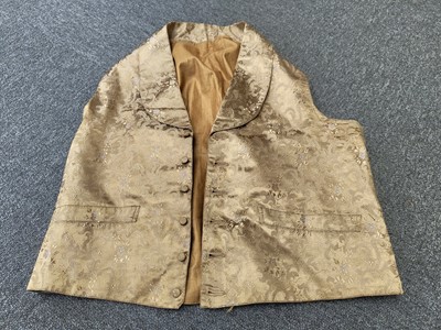 Lot 718 - Clothing.  A blue brocade skirt, circa 1850s, & other skirts, shoes, and waistcoats