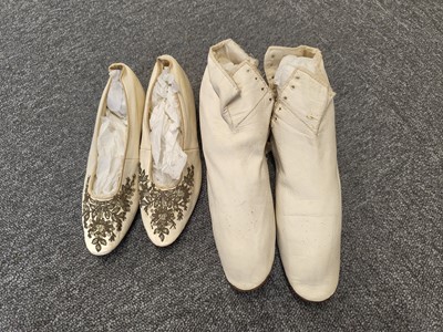 Lot 718 - Clothing.  A blue brocade skirt, circa 1850s, & other skirts, shoes, and waistcoats