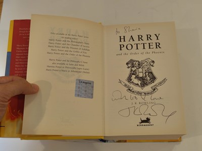 Lot 895 - Rowling (J. K.). A complete set of the Harry Potter books, all inscribed by the author, 7 volumes, 1998-2010 plus 6 other signed items