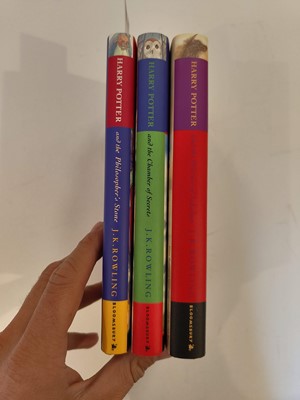 Lot 895 - Rowling (J. K.). A complete set of the Harry Potter books, all inscribed by the author, 7 volumes, 1998-2010 plus 6 other signed items
