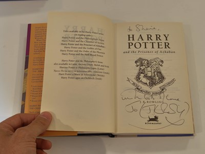 Lot 895 - Rowling (J. K.). A complete set of the Harry Potter books, all inscribed by the author, 7 volumes, 1998-2010 plus 6 other signed items