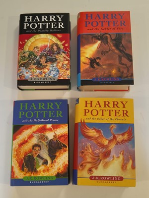 Lot 895 - Rowling (J. K.). A complete set of the Harry Potter books, all inscribed by the author, 7 volumes, 1998-2010 plus 6 other signed items