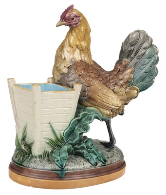 Lot 501 - Majolica. A Victorian Minton majolica spill vase modelled as a hen by John Henk