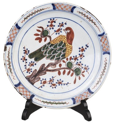 Lot 494 - Delft. A pair of Dutch delft 'parrot' plates, 18th century