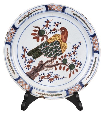 Lot 494 - Delft. A pair of Dutch delft 'parrot' plates, 18th century