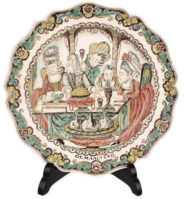 Lot 491 - Creamware.  A matched pair of English creamware plates, late 18th century