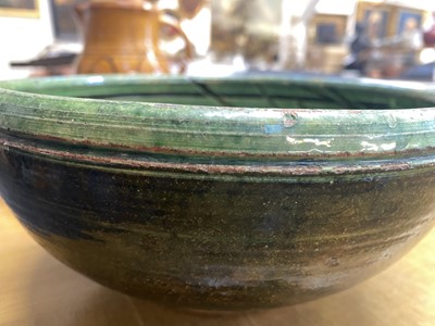 Lot 527 - Finch (Ray, 1914-2012) for Winchcombe Pottery. A green pottery bowl