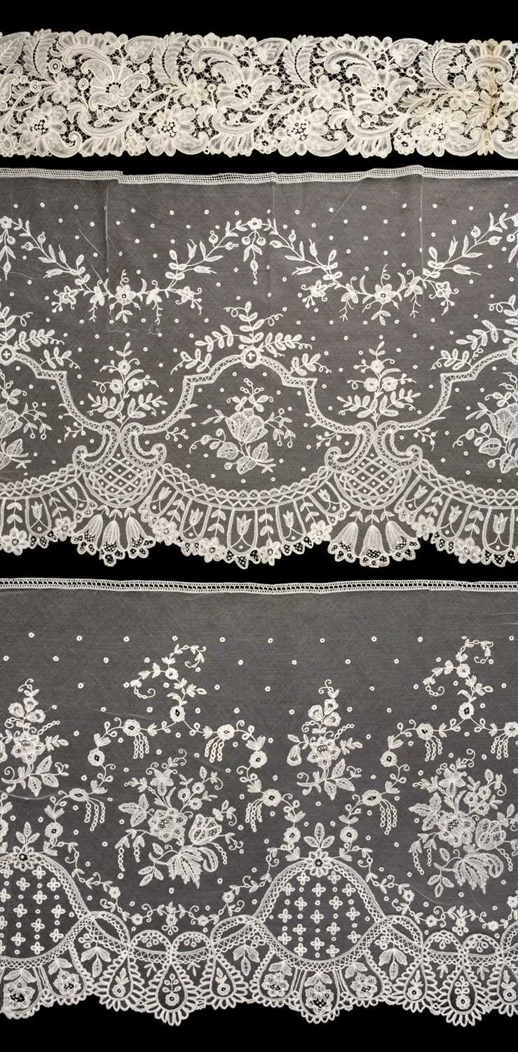 Lot 761 - Lace. Four large flounces, 19th century, & other lace