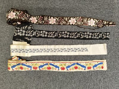 Lot 716 - Chinese Embroideries. A collection of needlework borders, 19th-early 20th century