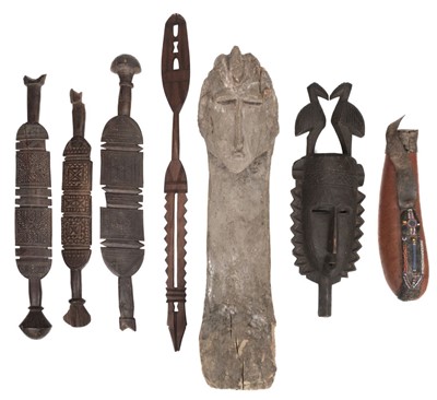 Lot 559 - Tribal Art. Three North African carved wood tent pegs
