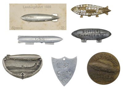 Lot 494 - Airship Badges. R101 GFAAW commemorative brooch and Zeppelin badges