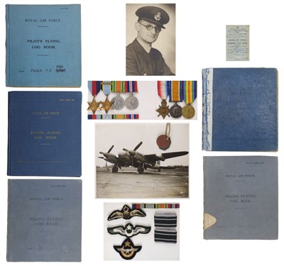 Lot 454 - Log Book: Medals and Log Books to Flight Lieutenant T.J. Pugh, Royal Air Force