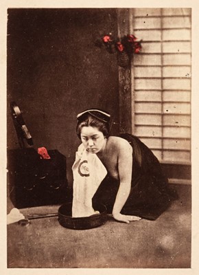 Lot 67 - Japan. A group of 8 mostly hand coloured albumen prints of Japanese people, c. 1870
