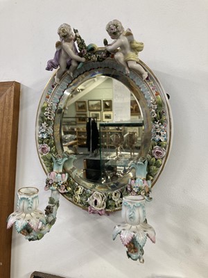 Lot 448 - Wall Mirrors. A pair of Dresden porcelain wall mirrors