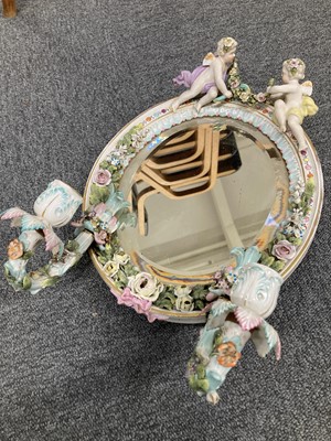 Lot 448 - Wall Mirrors. A pair of Dresden porcelain wall mirrors