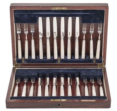 Lot 605 - Canteen. A set of silver tea knives and forks