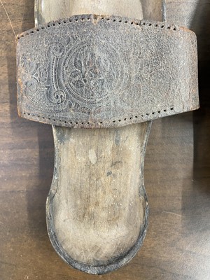 Lot 328 - Clothing. A pair of wooden pattens, probably 18th century