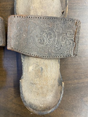 Lot 328 - Clothing. A pair of wooden pattens, probably 18th century
