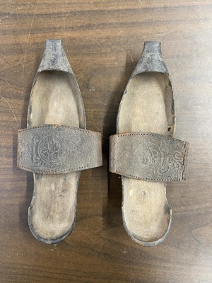 Lot 328 - Clothing. A pair of wooden pattens, probably 18th century