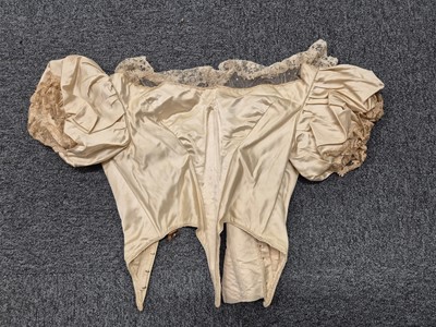 Lot 334 - Clothing. A two-piece satin wedding gown, circa 1840s, & other wedding attire, 19th-early 20th cent.