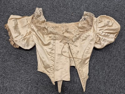 Lot 334 - Clothing. A two-piece satin wedding gown, circa 1840s, & other wedding attire, 19th-early 20th cent.