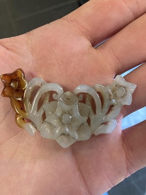 Lot 490 - Jade. A jade panel, carved as a carp catching a dragonfly and other pieces