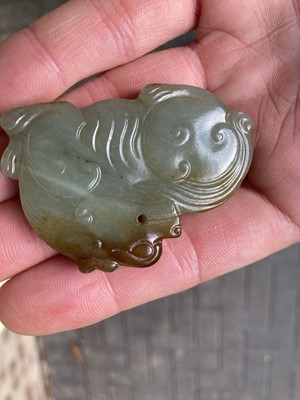 Lot 490 - Jade. A jade panel, carved as a carp catching a dragonfly and other pieces