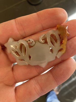 Lot 490 - Jade. A jade panel, carved as a carp catching a dragonfly and other pieces