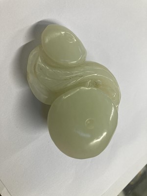 Lot 486 - Jade. A Chinese jade boulder and other pieces