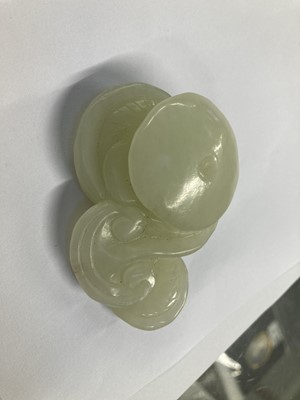 Lot 486 - Jade. A Chinese jade boulder and other pieces
