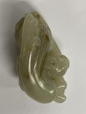 Lot 488 - Jade. A Chinese jade fruit, carved as berries and vine and other pieces