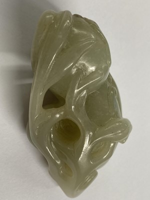 Lot 488 - Jade. A Chinese jade fruit, carved as berries and vine and other pieces