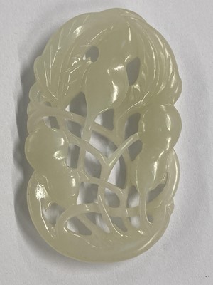 Lot 488 - Jade. A Chinese jade fruit, carved as berries and vine and other pieces
