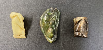 Lot 491 - Jade. A spinach green jade boulder and other pieces
