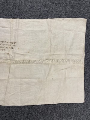 Lot 310 - Bed Linen. An early 18th century pillowcase, 1710, & a linen night gown