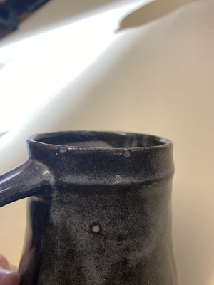 Lot 403 - Leach Pottery. Three beer tankards