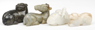 Lot 655 - Jade. A Chinese jade carving of a recumbent deer and other carved animals