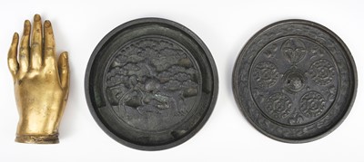 Lot 649 - Buddha. A Chinese parcel gilt bronze Buddha's hand, 18th century, and hand mirrors