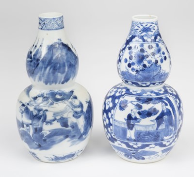 Lot 666 - Vases. Two Chinese blue and white porcelain double gourd vases
