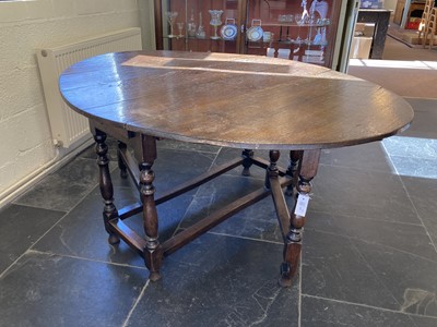 Lot 680 - Table. An oak gateleg table, 19th-century