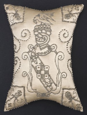 Lot 582 - Sewing. An armorial pinwork pincushion, 1740