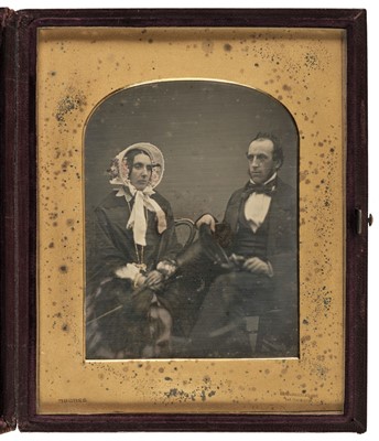 Lot 126 - Daguerreotype of a husband and wife seated together, photographed by Cornelius Jabez Hughes