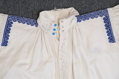 Lot 534 - Clothing. A Ukrainian linen smock, early 20th century, & other items