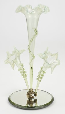 Lot 690 - Epergne. A Victorian cranberry glass epergne centrepiece plus two others